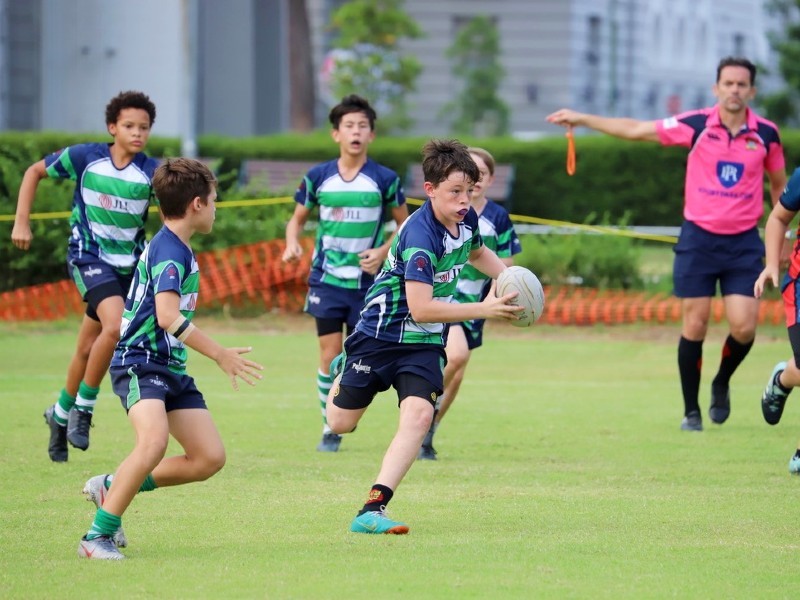 Dragons Rugby Club kids sport boys playing rugby on field