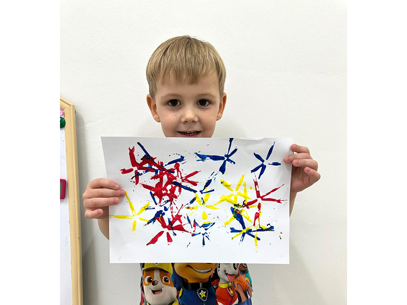 special needs education child with artwork - DICE Early Intervention & Therapy