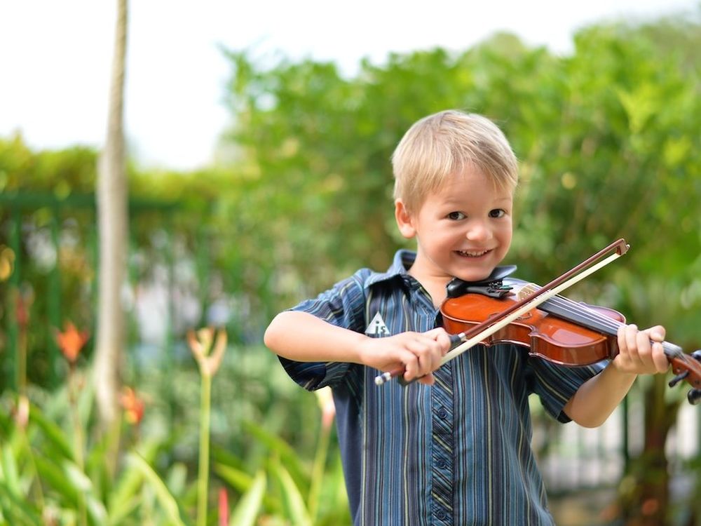 Learning violin from age 3