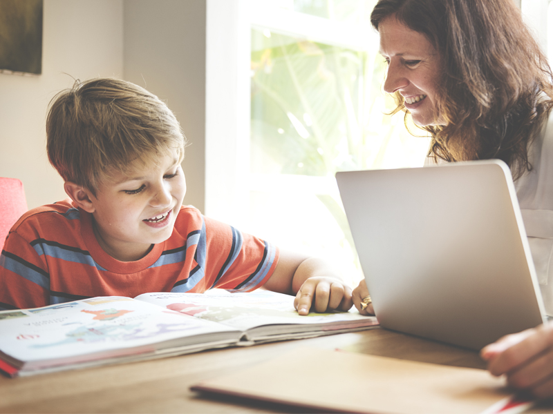 Parent and child studying Home-schooling