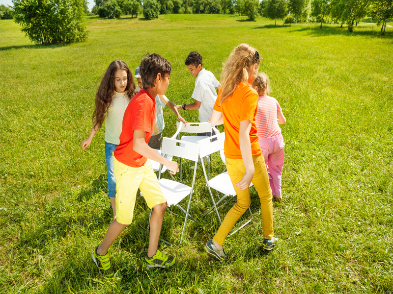 Great kids' party games, kids playing musical chairs, kids party, games, musical chairs