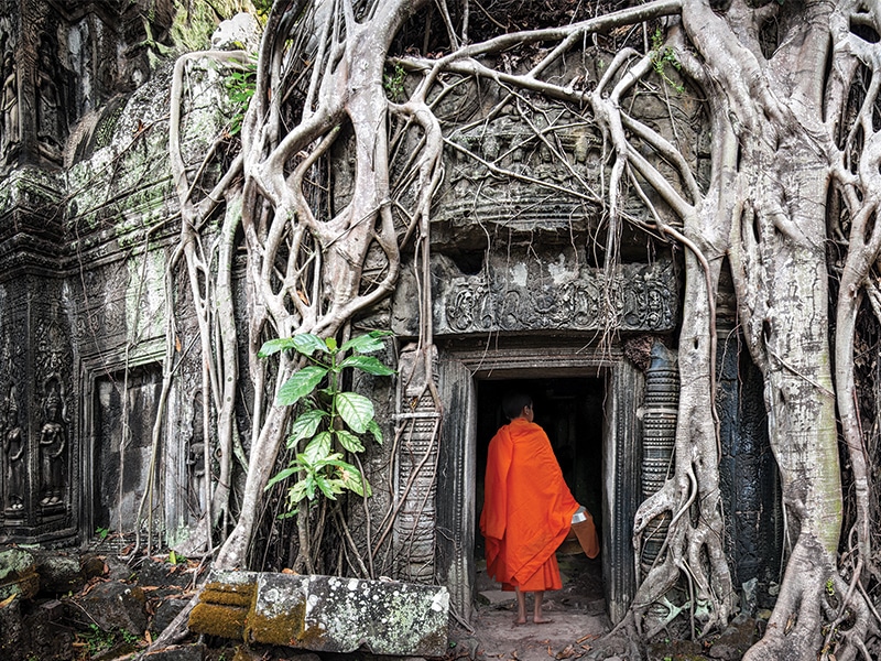 image of a monk at Cambodia's Angkor Wat