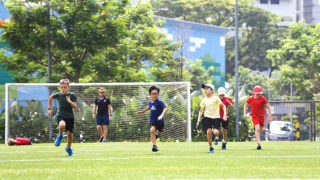 sports at international schools primary school boys on soccer pitch