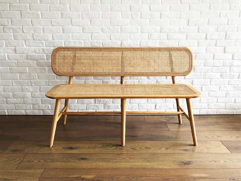 Tamu bench in Sungkai wood and rattan cane weave, $450, The Furniture Makers