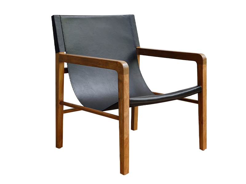 Sling chair in teak wood and leather, $529, Island Living
