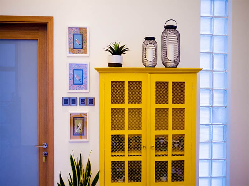 East Coast Penthouse yellow cabinet