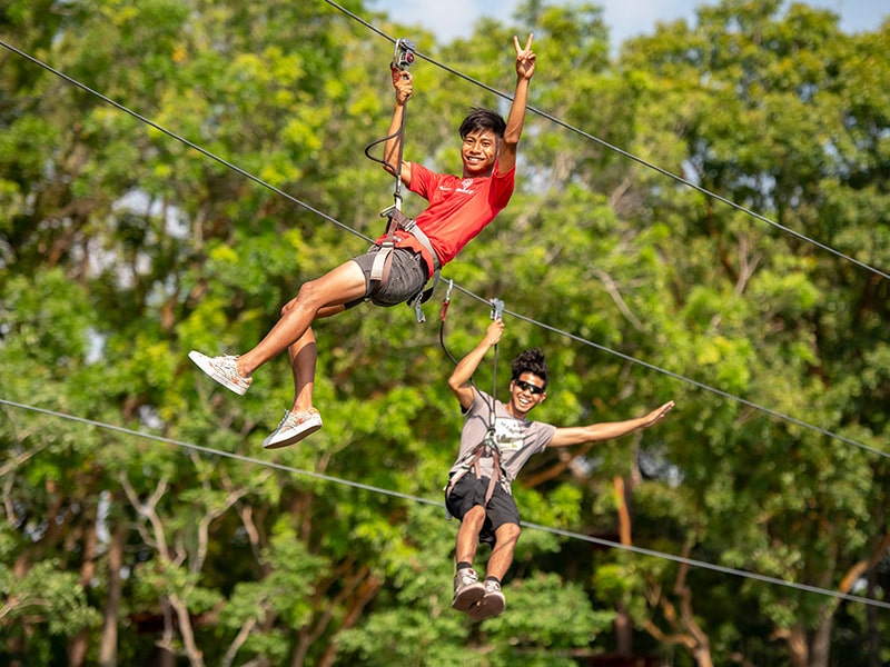 image of teenagers at Forest adventure for story on things to do with kids in Singapore