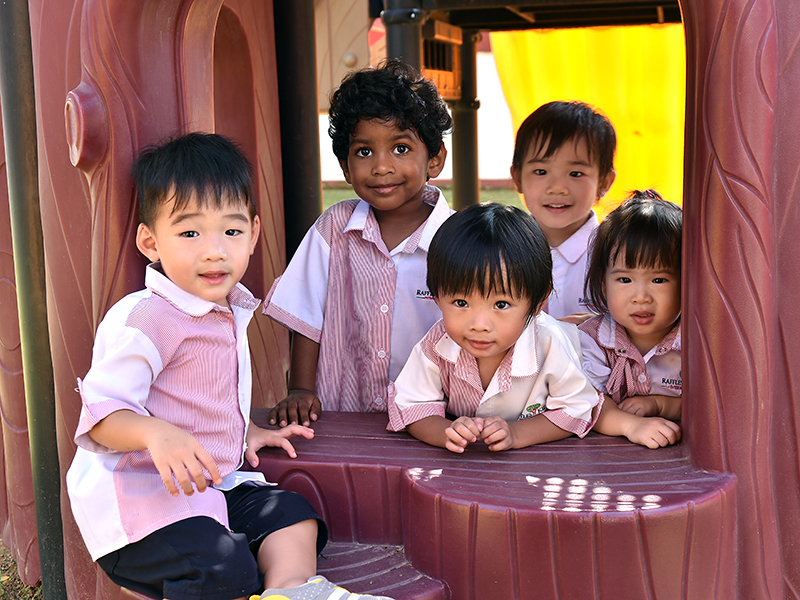 students at Raffles Kiz international preschools in Singapore with preschools near me