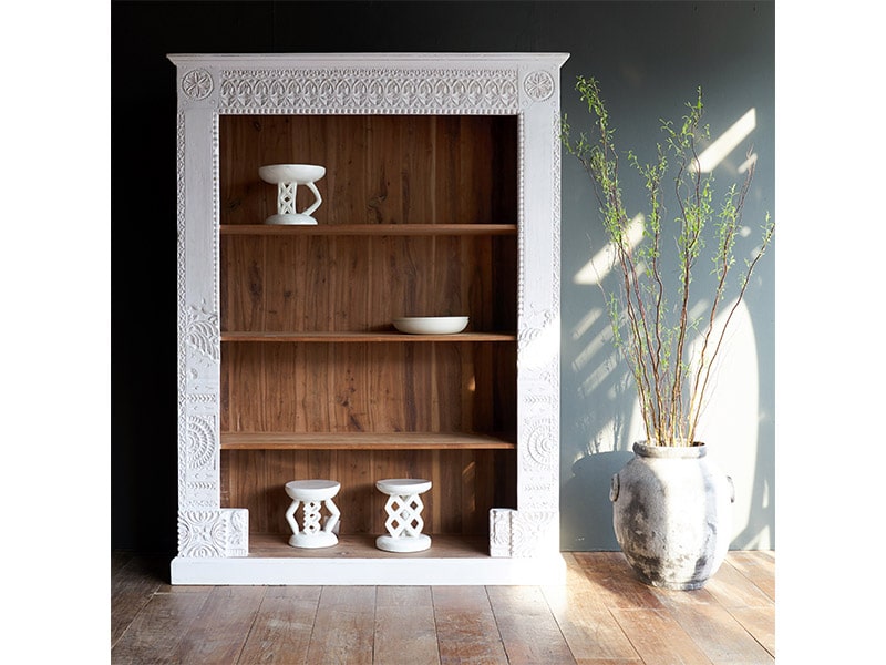 This large India bookcase anchors the area, $3,800