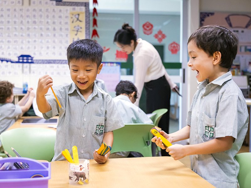 playing games to Learn mandarin in singapore - SJI International