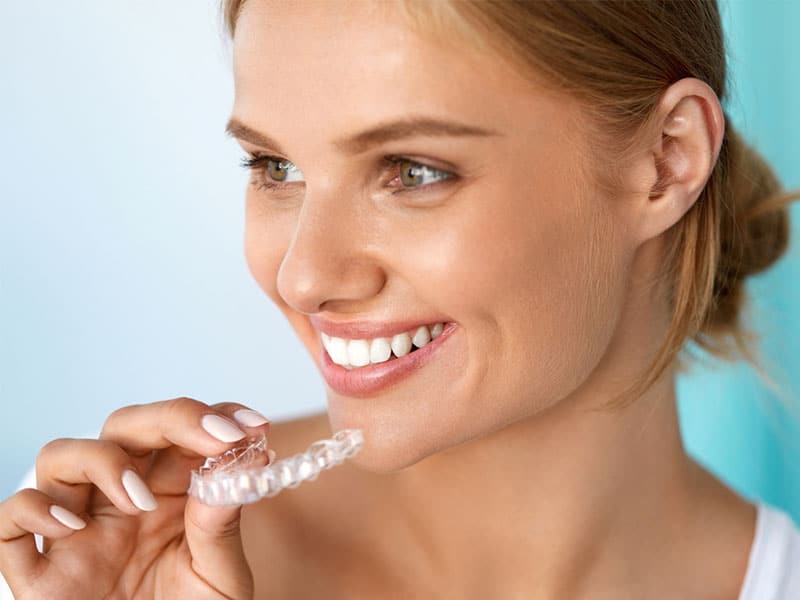 Woman with Invisalign teeth straightening