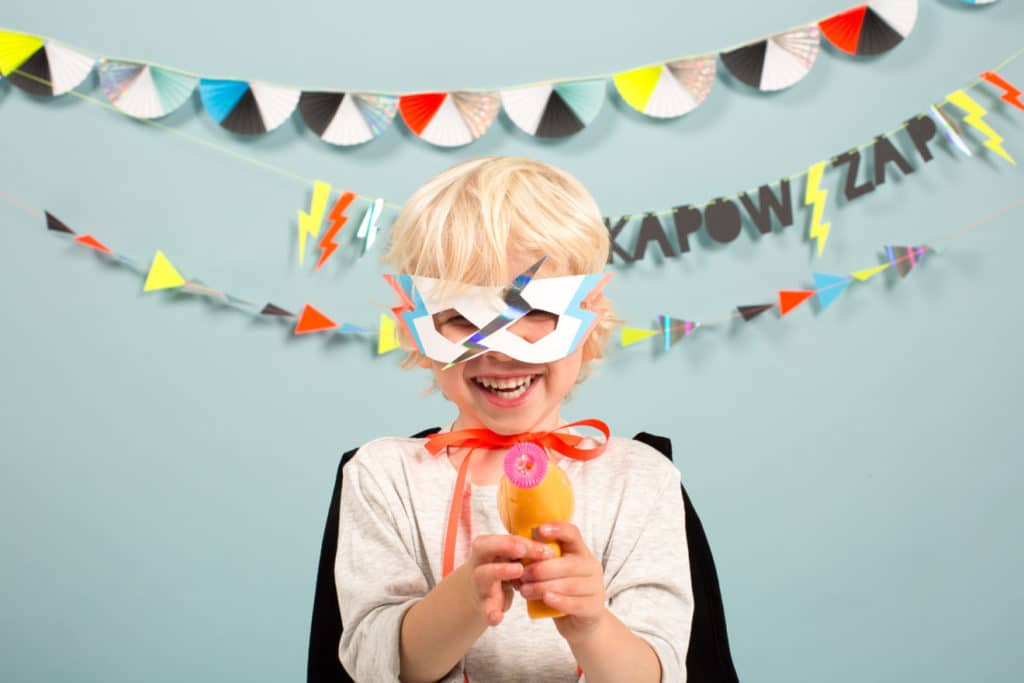 child holding party decorations from Cuckoo Little Lifestyle in Singapore