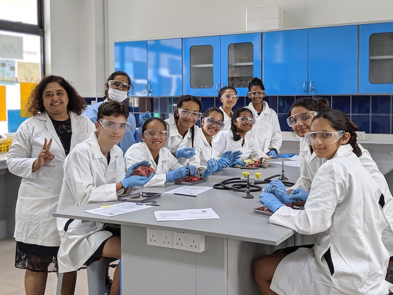 One World International School British curriculum school students in the science lab
