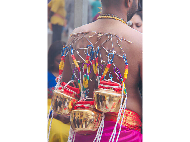 Thaipusam carrying milk Hindu ritual of Thaipusam parade