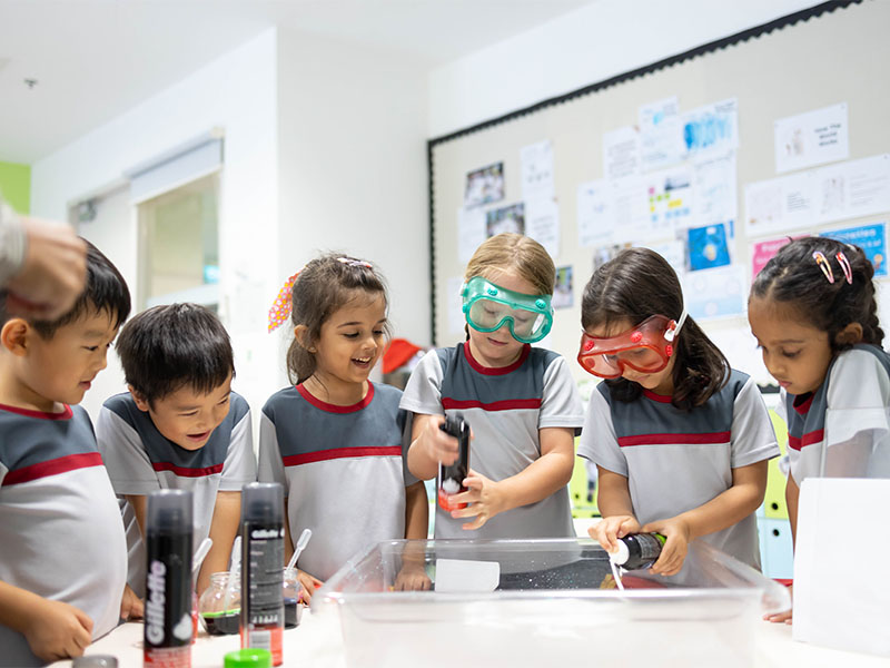 XCL World Academy students in science lab international school curriculum