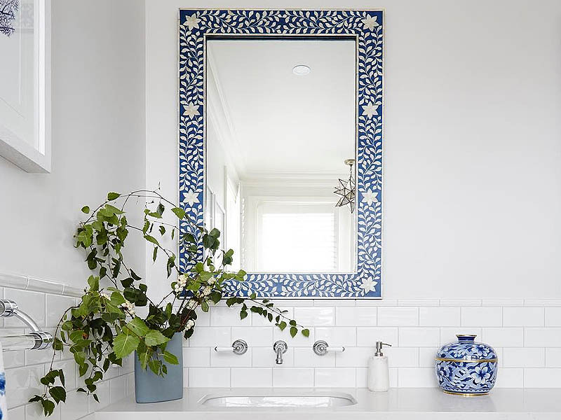 Bone-inlay mirror in a royal-blue leaf pattern, $750, Hacienda Blue