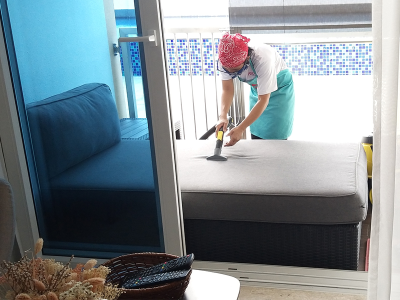 Part-time cleaners maid agencies in Singapore vacuuming sofa home services