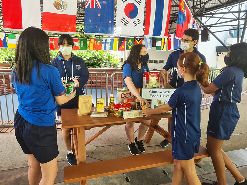 Chatsworth international school students service learning community work food drive