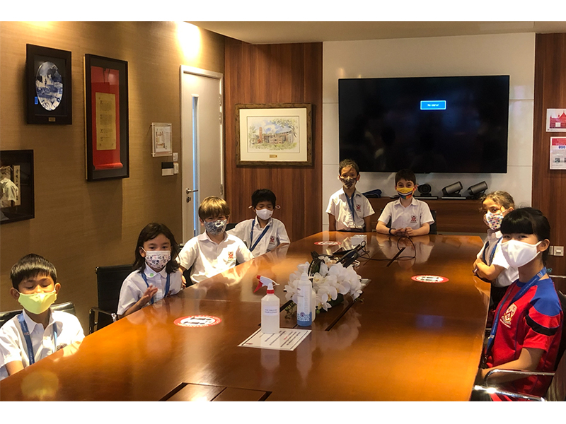 Dulwich College Singapore students meeting room service learning