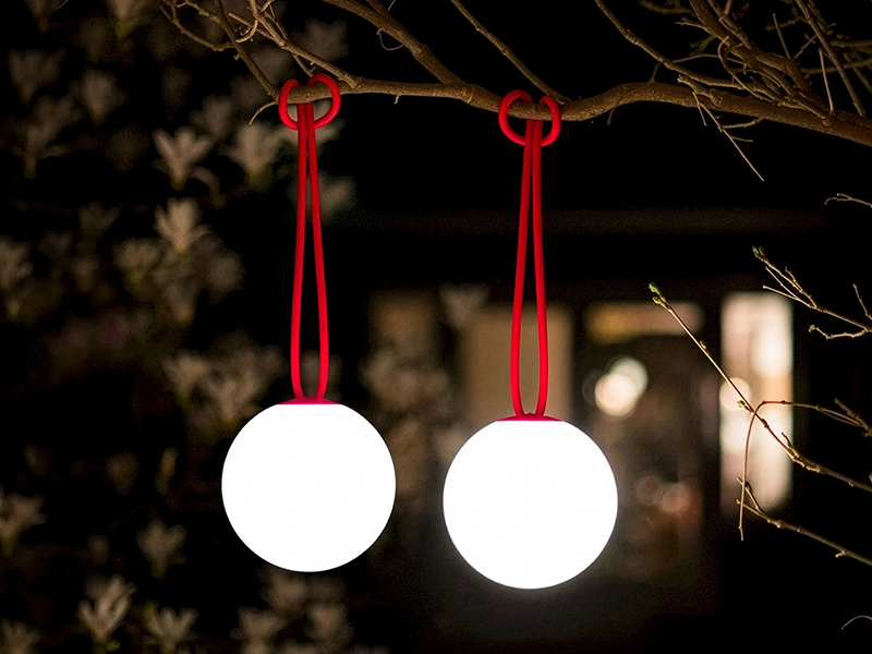 floor lamps and hanging garden lights from soul and tables