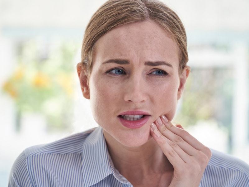 tooth sensitivity from receding gums during menopause