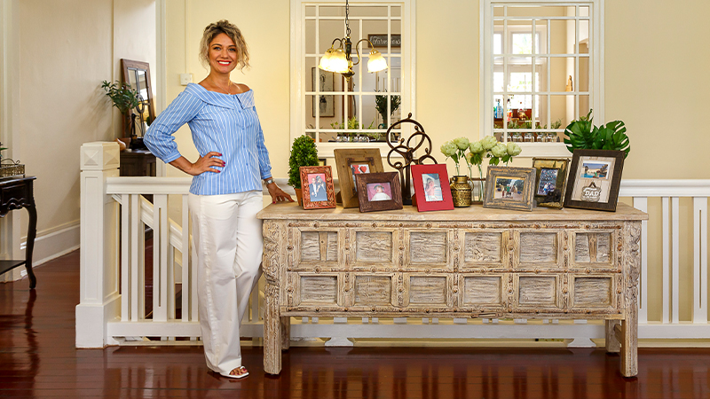 Woody Antiques - Paula with antique cabinet
