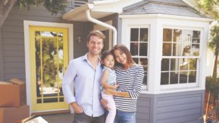 America Mortgages happy family in front of US property