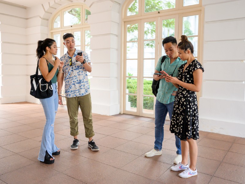 work together as a team in a treasure hunt explore Singapore Civic District