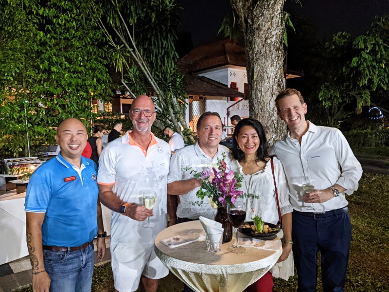 Swiss club singapore members at an evening event