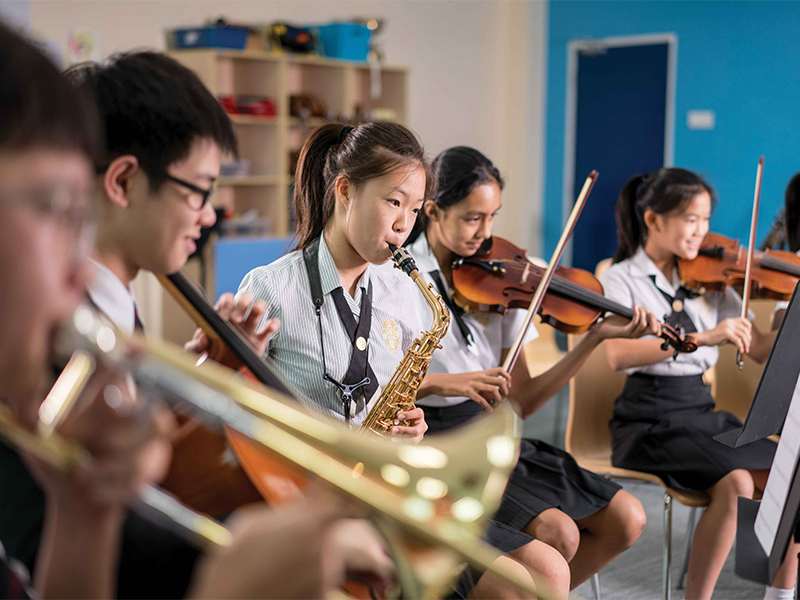 Epsom boarding school students in music class