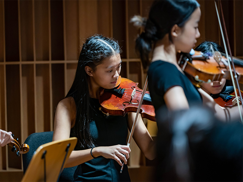 music elective programme Tanglin Trust School students music scholarship playing violin