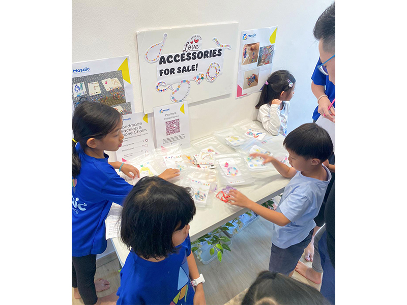Mosaic Play Academy kids hands on learning at accessories stand