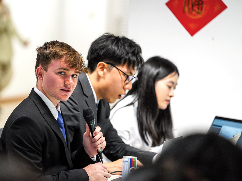 CIS students preparing for Yale Model United Nations Singapore debate session