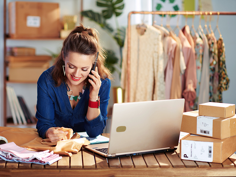 woman using business services, xero accounting software to manage small business