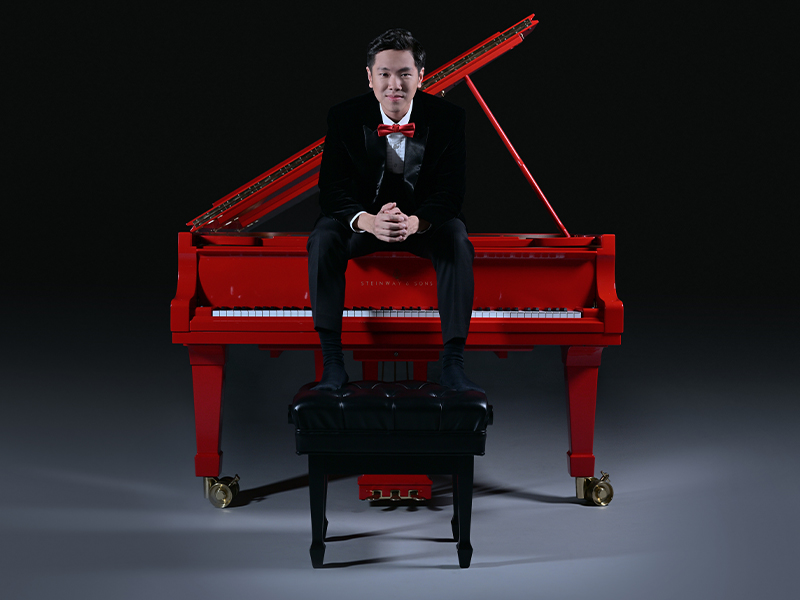 Congyu Wang on red piano - piano concert Singapore festival organiser