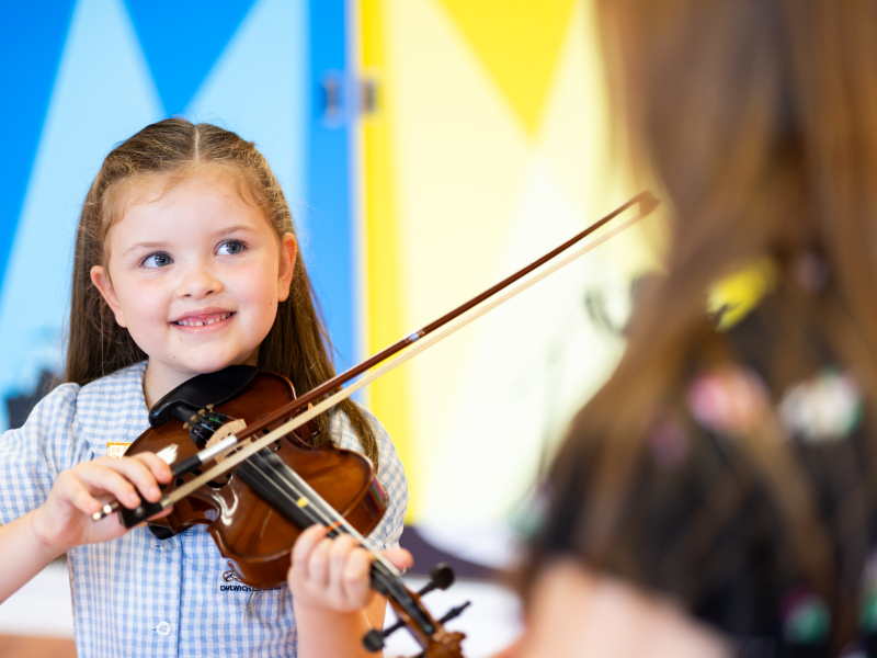 international student playing violin - Dulwich College Singapore