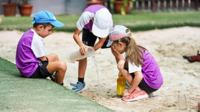 CIS students learning through play outdoors
