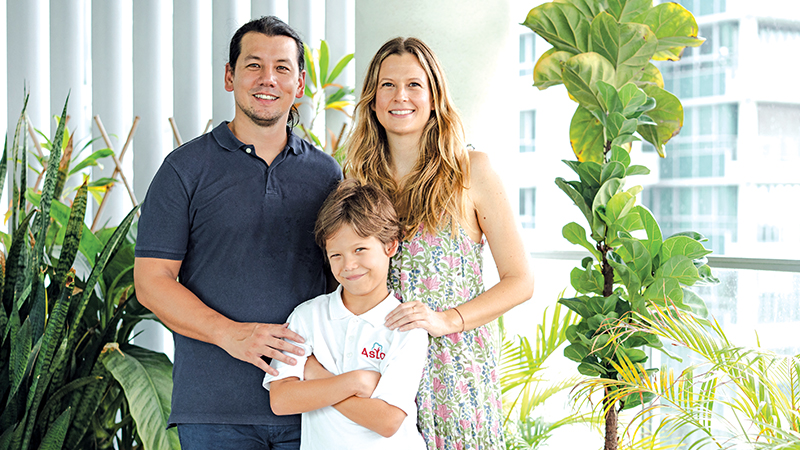 image of parents with son who attends Astor International School in Singapore