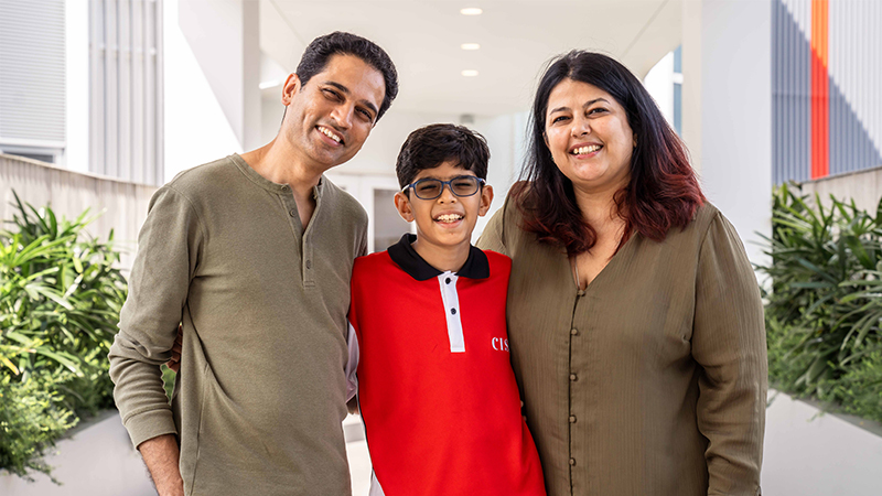 image of Indian family with son at CIS - top international schools in Singapore