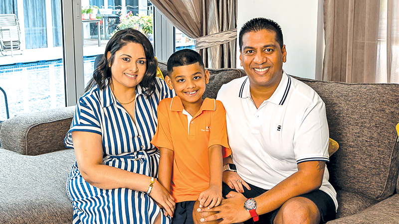 image of South African parents with child from one of the top international schools in Singapore - The Winstedt