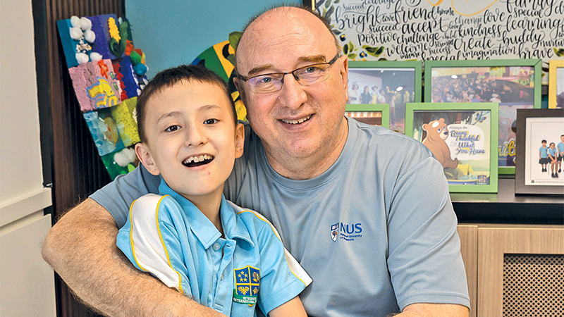 image of father with child at top international schools in Singapore - IIS