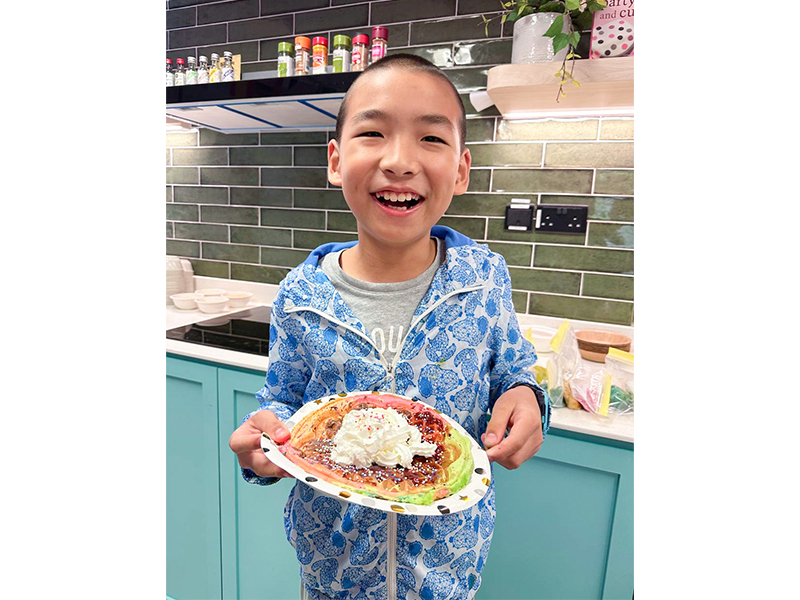 cooking holiday camps at IIS encourage child development of skills