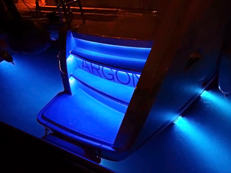 image of Singapore yacht charter Argon lit up at night