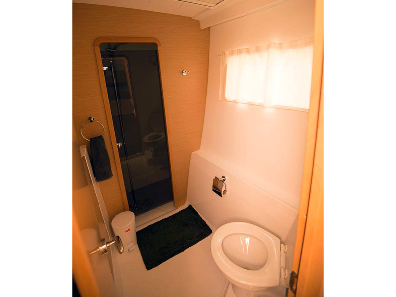 separate shower and toilet onboard Argon - renting a yacht in Singapore