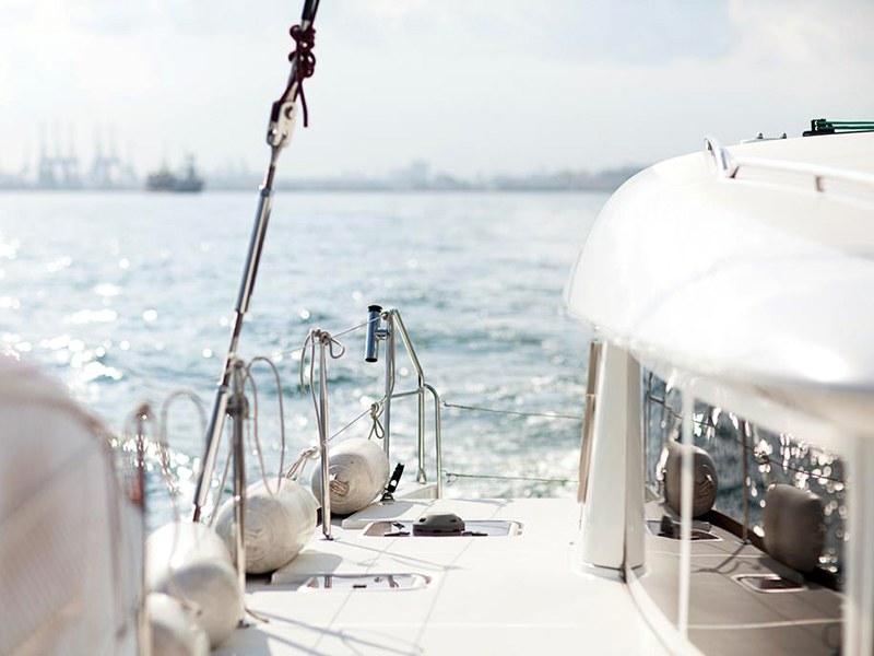 renting a yacht in Singapore- view from side of boat
