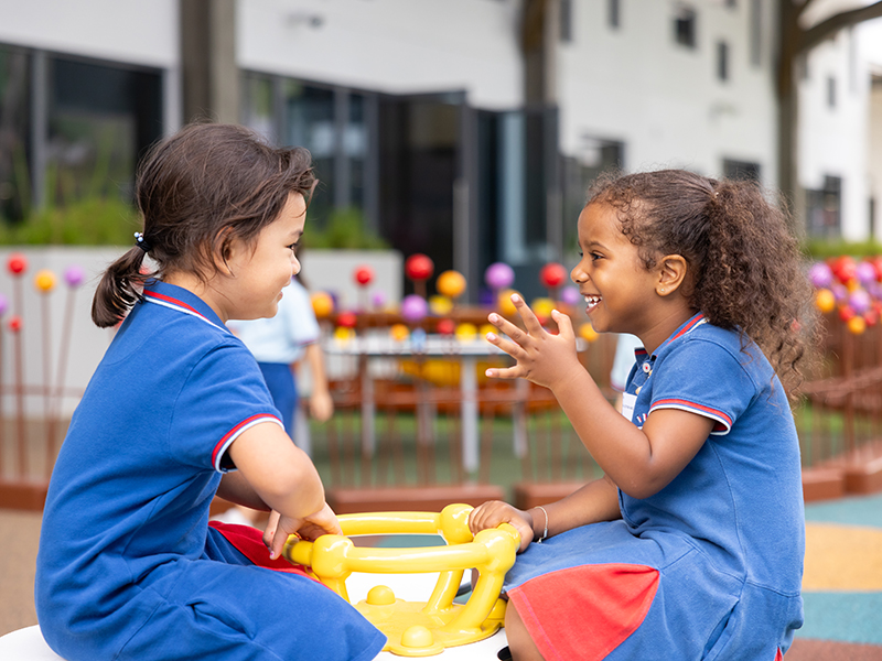 EIS early education curriculum - IFS students in playground