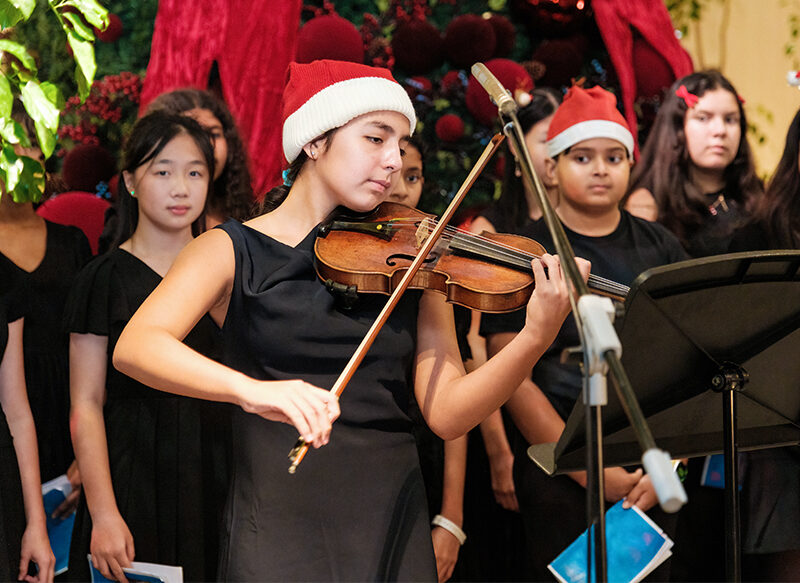 performance by Stamford American students - Suzuki method violin lessons