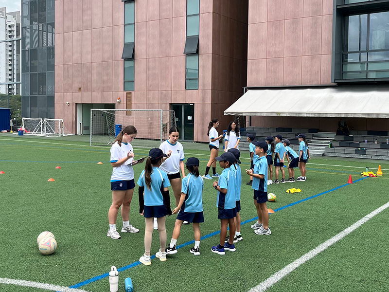 international students in Singapore on sports field