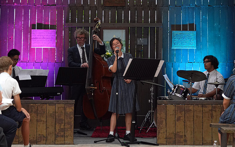 Aurelia Ree, Year 10 Australian International School Singapore vocalist performing at Changi Chapel and Museum